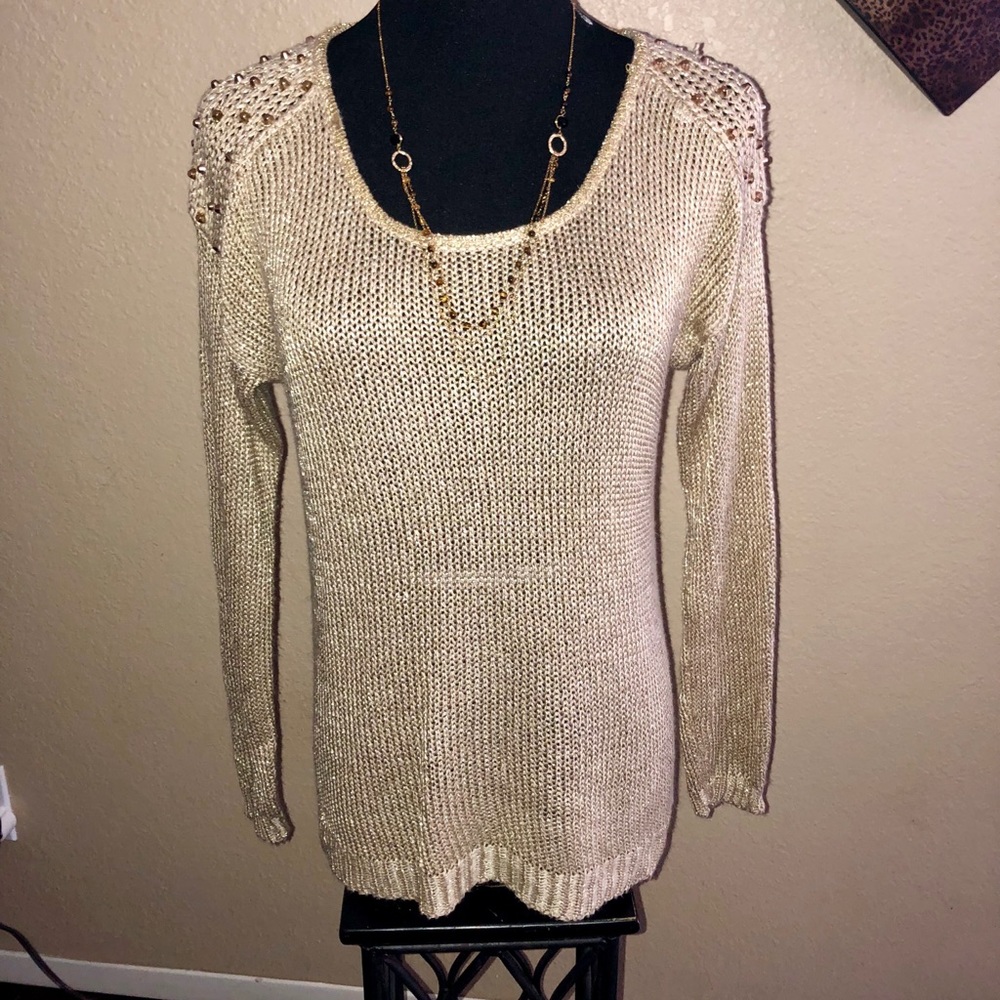 Stunning gold sweater with gold stud detailing.